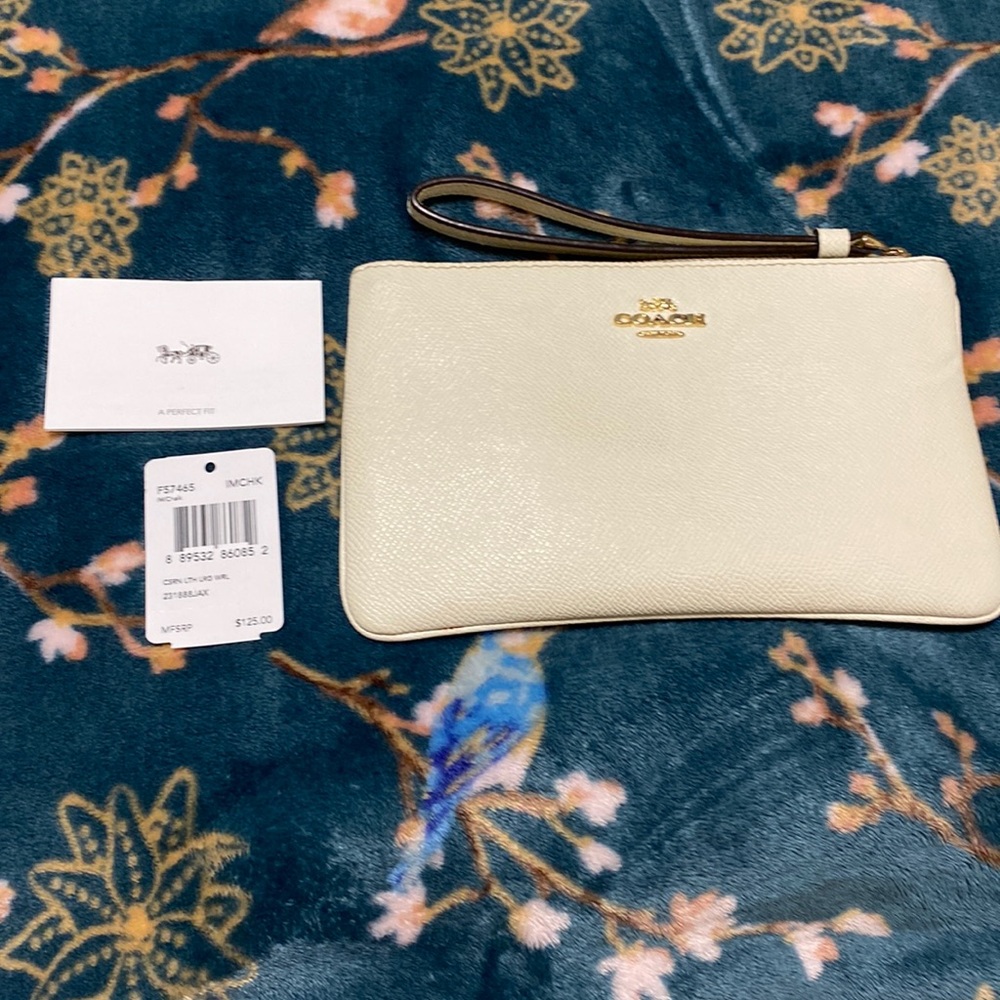 Coach corner wristlet chalk and Gold